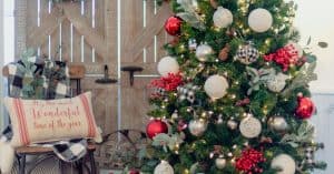 Farmhouse Christmas Decorations with Christmas Tree and Chair Next To It- Open for Christmas