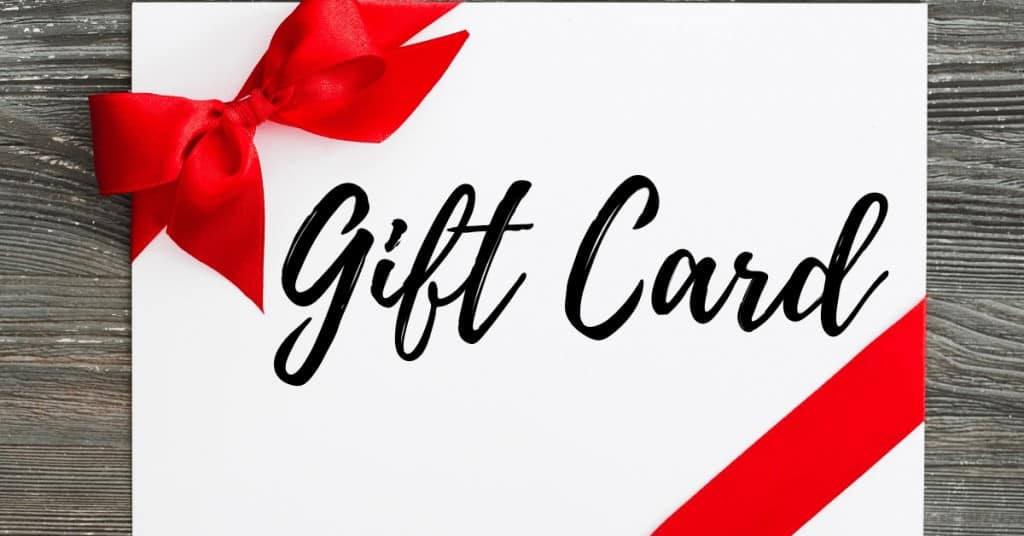 Gift Card Written on White Card with Red Bow - Best Christmas gifts for couples