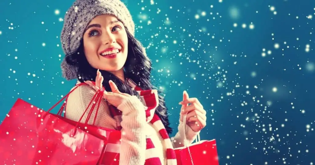 A woman doing her Christmas shopping - tips on how to shop this holiday - Open for Christmas