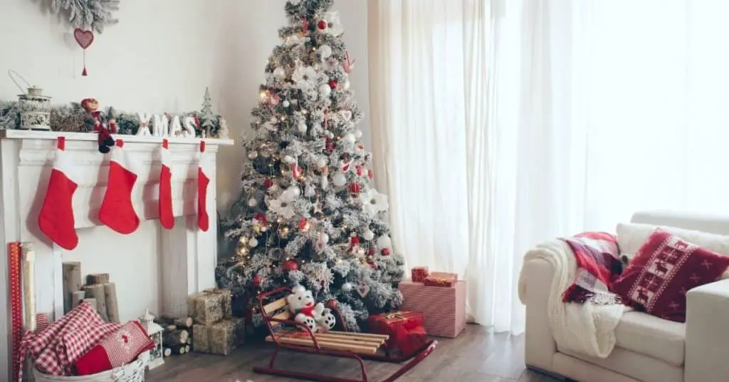 Red and White Decorated Tree in a Living Room - Open for Christmas