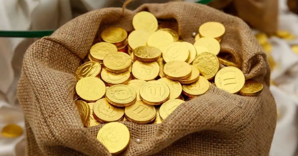 Sack full of gold coins - Who is Kris Kringle - Open for Christmas