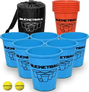 A collection of brightly colored buckets filled with water and a set of soft, lightweight balls used in the exhilarating game of Bucket Ball Beach Edition.